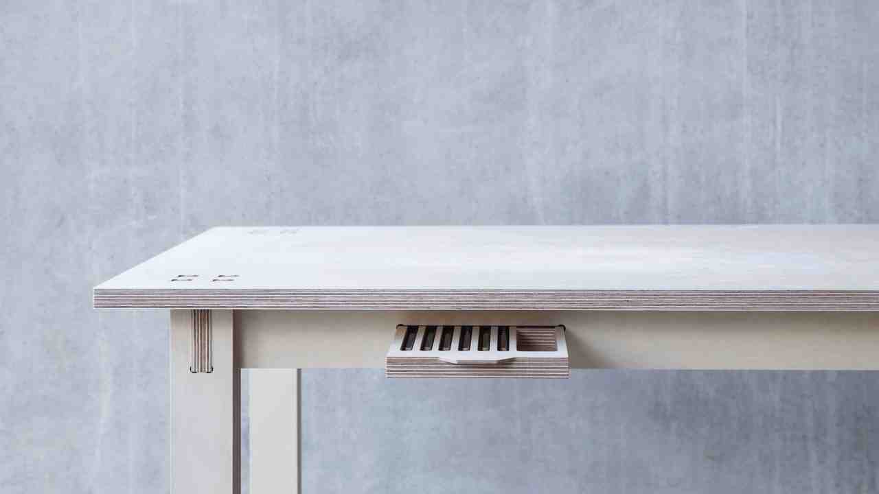 Front view of the Layout table with tray detail, a creative user workspace table by Josh Worley for Opendesk